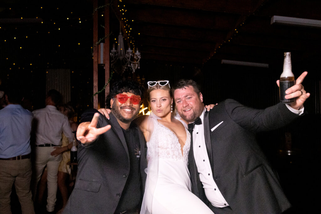 shey from firecracker photobooths with a bride and groom