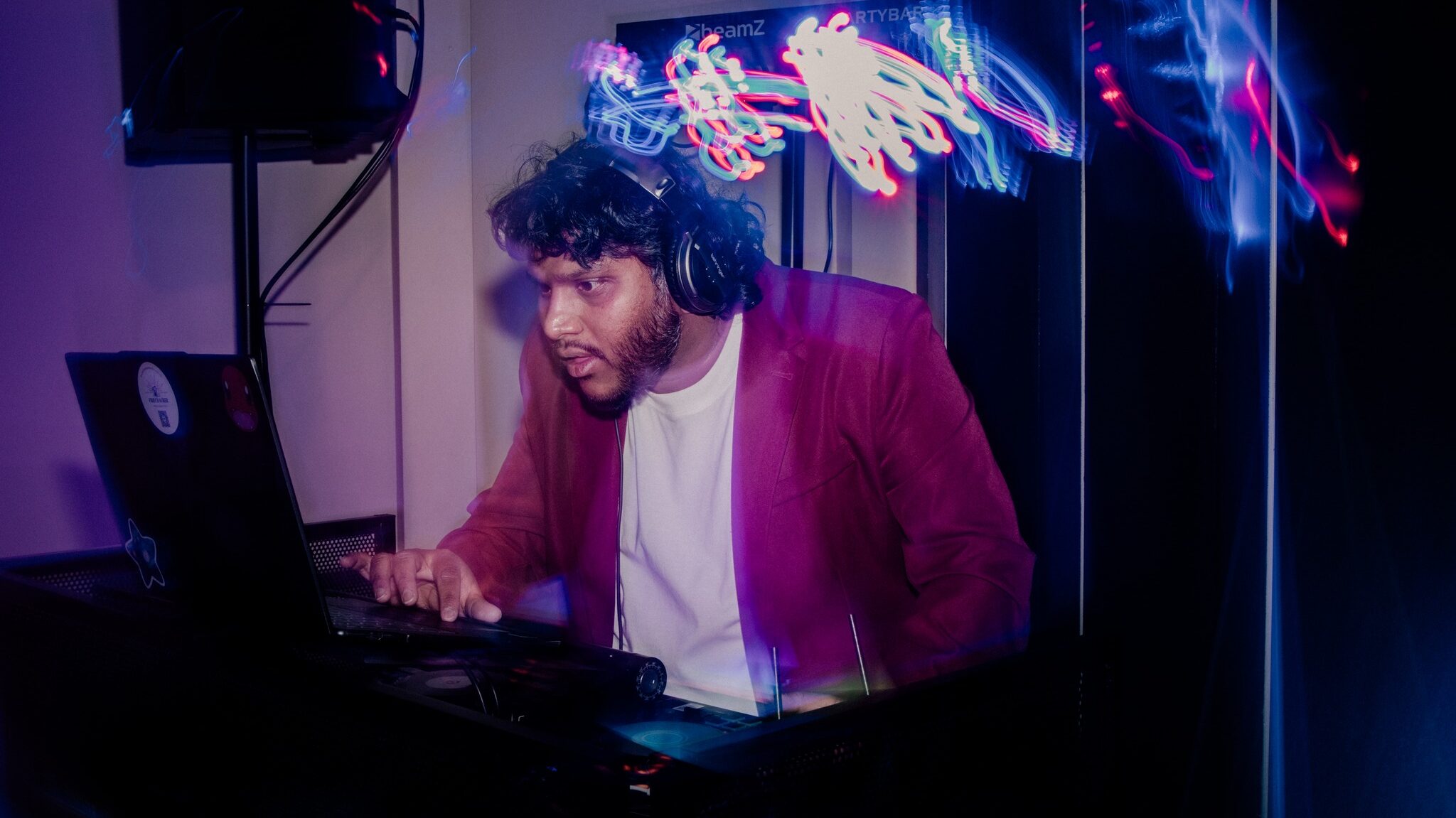 Bathurst Wedding DJ Shey Bx is at his decks. Photo courtesy of Meredith Photography