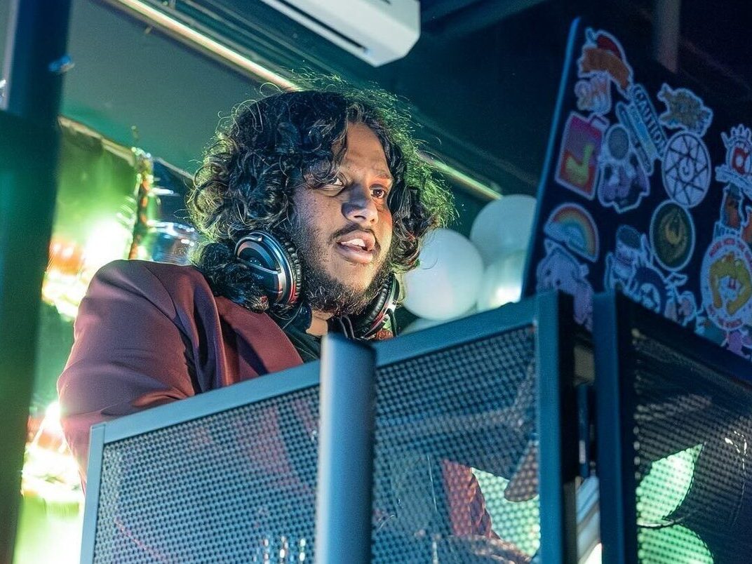 DJ Shey Bx Bathurst Wedding DJ on stage shot by Charlie W Visuals